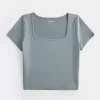 Baby-T-Shirt aus weichem, nahtlosem Stretch-Stoff mit quadratischem Ausschnitt Baby-T-Shirt aus weichem, nahtlosem Stretch-Stoff mit quadratischem Ausschnitt