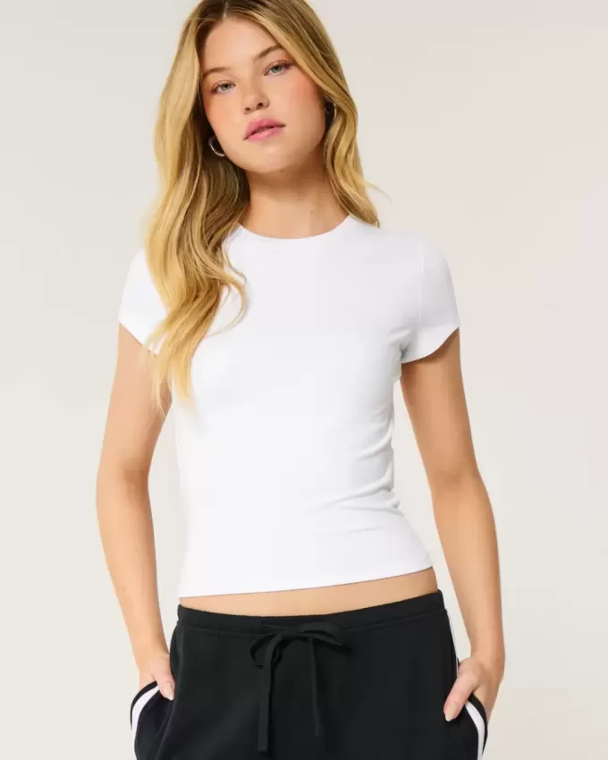 Baby-T-Shirt mit Rundhalsausschnitt aus weichem, nahtlosem Stretch-Stoff Baby-T-Shirt mit Rundhalsausschnitt aus weichem, nahtlosem Stretch-Stoff