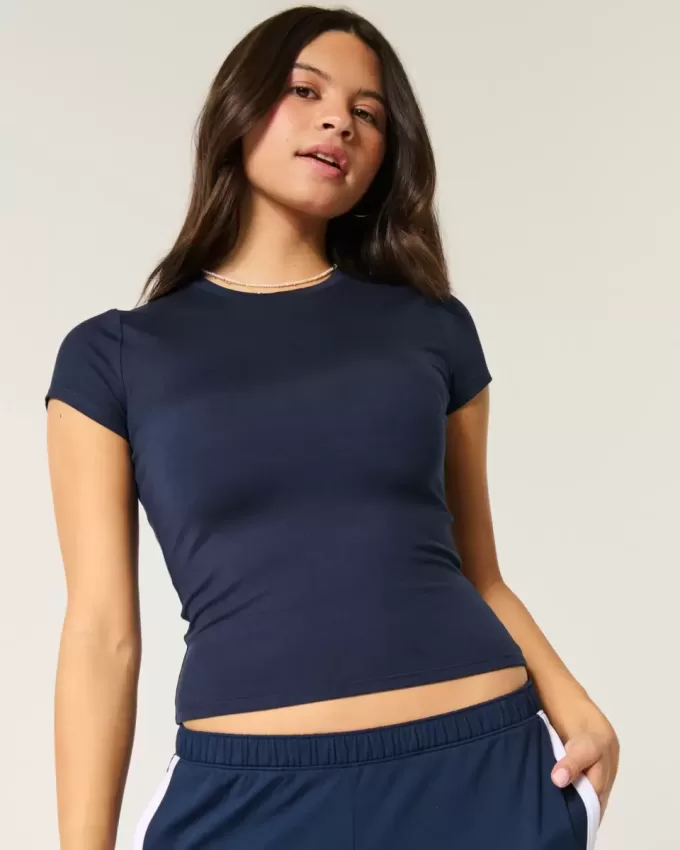 Weiches, nahtloses Longline-Baby-T-Shirt aus elastischem Stoff Weiches, nahtloses Longline-Baby-T-Shirt aus elastischem Stoff
