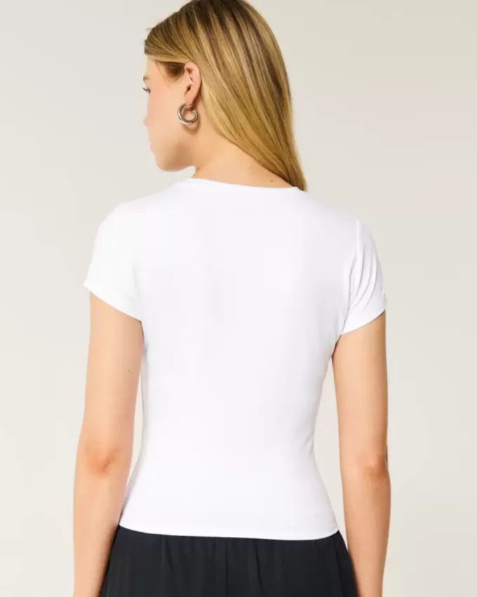 Baby-T-Shirt mit Rundhalsausschnitt aus weichem, nahtlosem Stretch-Stoff Baby-T-Shirt mit Rundhalsausschnitt aus weichem, nahtlosem Stretch-Stoff