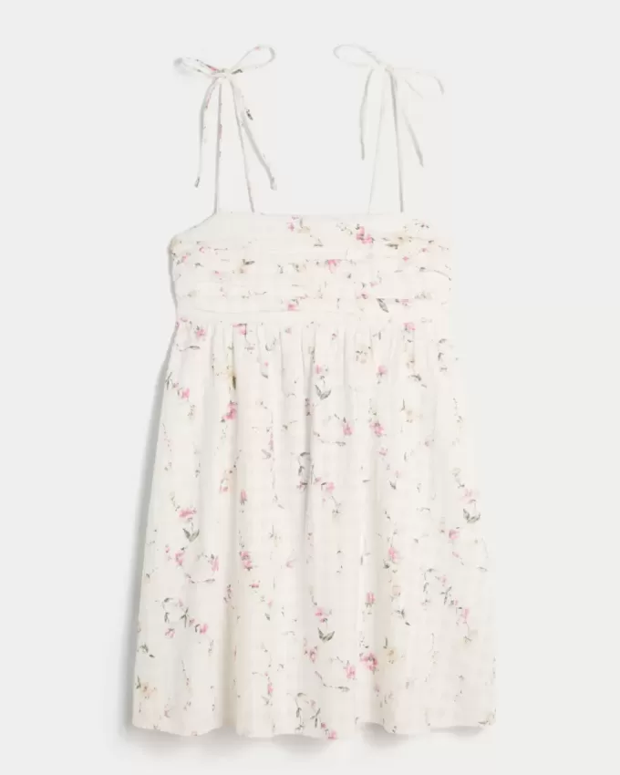 Babydoll-Minikleid mit Bindeträgern Babydoll-Minikleid mit Bindeträgern