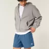 Baggy-Fußballshorts bis zur Mitte des Oberschenkels Baggy-Fußballshorts bis zur Mitte des Oberschenkels