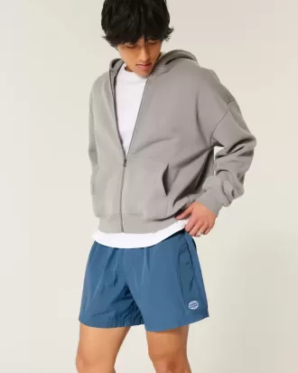 Baggy-Fußballshorts bis zur Mitte des Oberschenkels