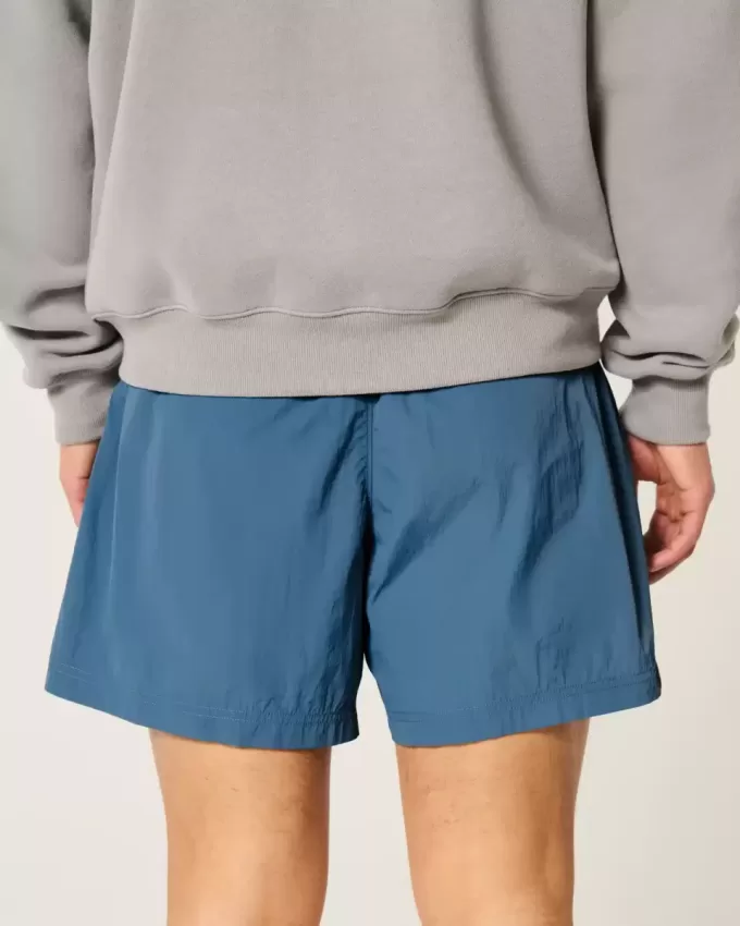 Baggy-Fußballshorts bis zur Mitte des Oberschenkels Baggy-Fußballshorts bis zur Mitte des Oberschenkels