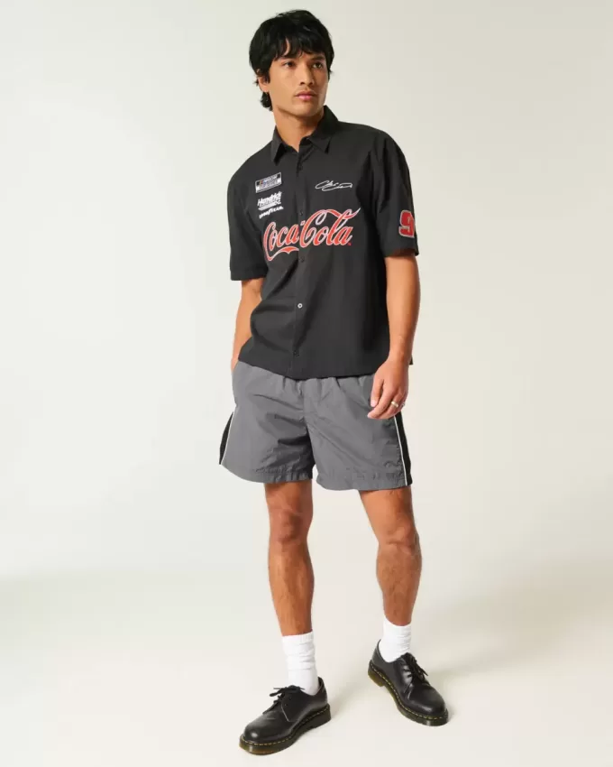 Baggy-Fußballshorts bis zur Mitte des Oberschenkels Baggy-Fußballshorts bis zur Mitte des Oberschenkels