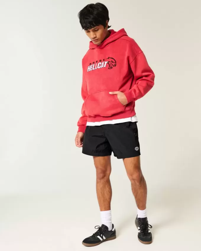 Baggy-Fußballshorts bis zur Mitte des Oberschenkels Baggy-Fußballshorts bis zur Mitte des Oberschenkels