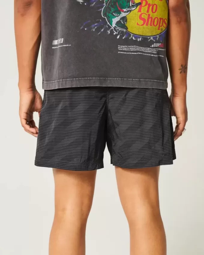Baggy-Fußballshorts bis zur Mitte des Oberschenkels Baggy-Fußballshorts bis zur Mitte des Oberschenkels