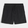 Baggy-Fußballshorts bis zur Mitte des Oberschenkels Baggy-Fußballshorts bis zur Mitte des Oberschenkels