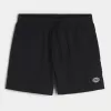 Baggy-Fußballshorts bis zur Mitte des Oberschenkels Baggy-Fußballshorts bis zur Mitte des Oberschenkels