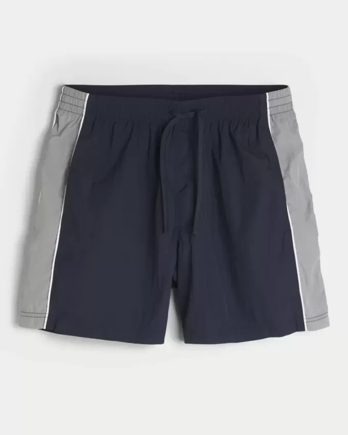 Baggy-Fußballshorts bis zur Mitte des Oberschenkels Baggy-Fußballshorts bis zur Mitte des Oberschenkels