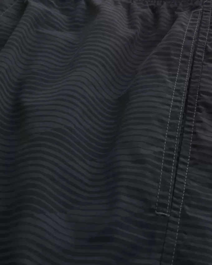 Baggy-Fußballshorts bis zur Mitte des Oberschenkels Baggy-Fußballshorts bis zur Mitte des Oberschenkels