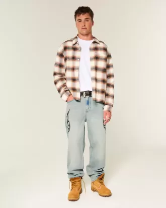 Baggy-Jeans mit Grafik in heller Waschung