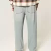 Baggy-Jeans mit Grafik in heller Waschung