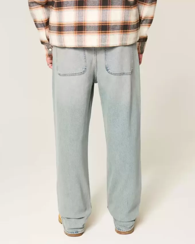 Baggy-Jeans mit Grafik in heller Waschung
