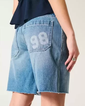 Baggy-Jeanshose mit niedriger Taille und mittlerer Waschung und Zahlengrafik