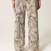 Baggy-Malerjeans mit Camouflage-Muster Baggy-Malerjeans mit Camouflage-Muster