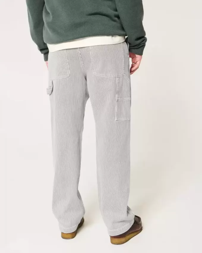 Baggy-Malerjeans mit Eisenbahnstreifen Baggy-Malerjeans mit Eisenbahnstreifen
