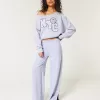 Bequemes, schulterfreies Sweatshirt mit NYC-Grafik