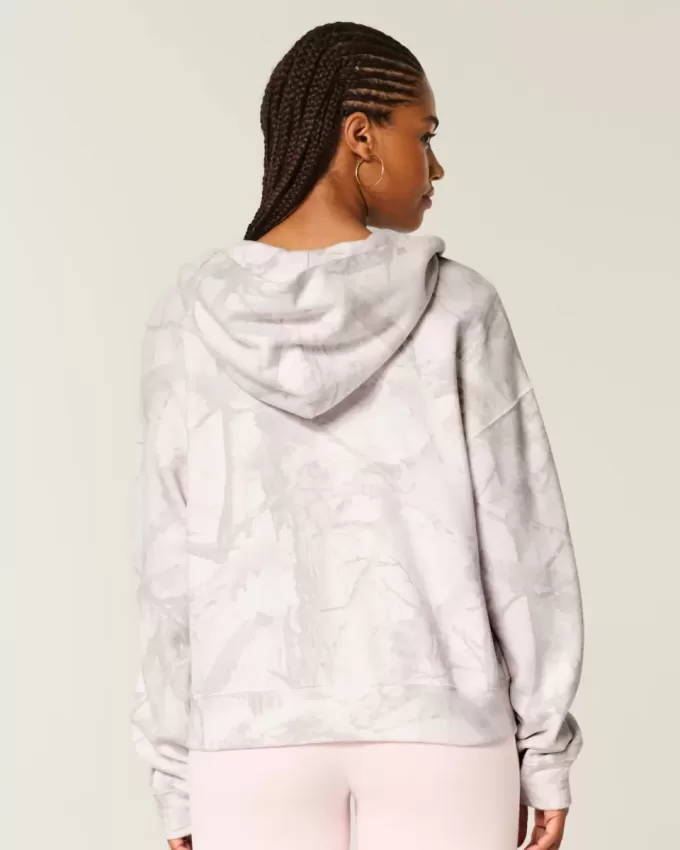 Übergroßer rosa Camouflage-Kapuzenpullover mit Reißverschluss Übergroßer rosa Camouflage-Kapuzenpullover mit Reißverschluss