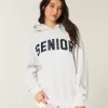 Übergroßer Senior-Kapuzenpullover mit Grafik Übergroßer Senior-Kapuzenpullover mit Grafik
