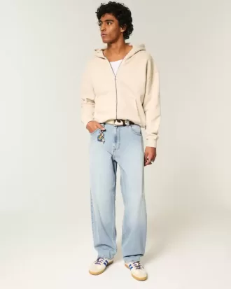 Bestickte Baggy-Skaterjeans in heller Waschung Bestickte Baggy-Skaterjeans in heller Waschung