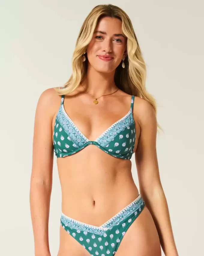 Bikinioberteil mit tiefem Ausschnitt und Bügel und Stickereien Bikinioberteil mit tiefem Ausschnitt und Bügel und Stickereien
