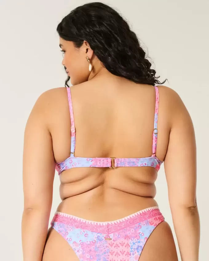 Bikinioberteil mit tiefem Ausschnitt und Bügel und Stickereien Bikinioberteil mit tiefem Ausschnitt und Bügel und Stickereien