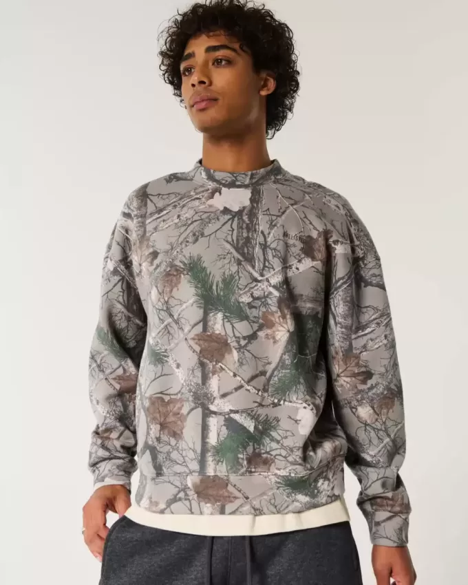 Boxy-Camouflage-Sweatshirt mit Rundhalsausschnitt und Logo Boxy-Camouflage-Sweatshirt mit Rundhalsausschnitt und Logo
