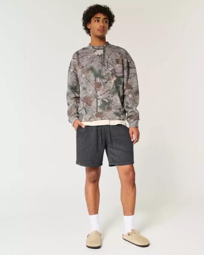 Boxy-Camouflage-Sweatshirt mit Rundhalsausschnitt und Logo Boxy-Camouflage-Sweatshirt mit Rundhalsausschnitt und Logo