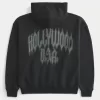 Boxy Hollywood Grafik-Kapuzenpullover mit Reißverschluss Boxy Hollywood Grafik-Kapuzenpullover mit Reißverschluss
