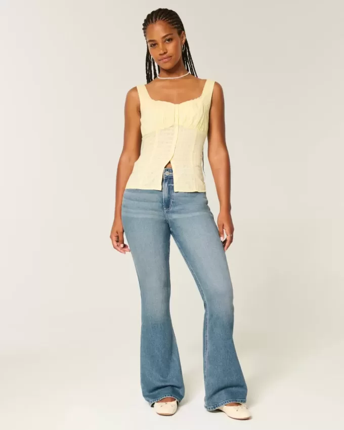 Curvy High-Rise Flare Jeans mit mittlerer Waschung Curvy High-Rise Flare Jeans mit mittlerer Waschung