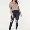 Curvy High-Rise-Jeansleggings in dunkler Waschung mit Rissen Curvy High-Rise-Jeansleggings in dunkler Waschung mit Rissen