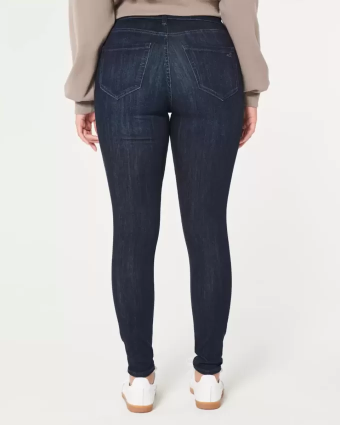 Curvy High-Rise-Jeansleggings in dunkler Waschung mit Rissen Curvy High-Rise-Jeansleggings in dunkler Waschung mit Rissen