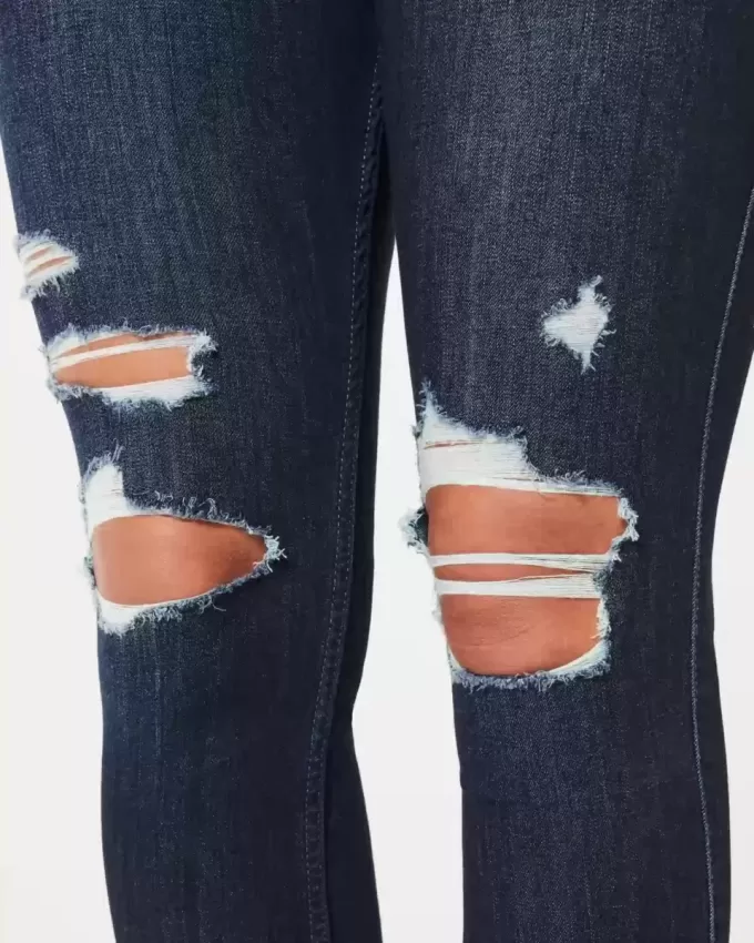 Curvy High-Rise-Jeansleggings in dunkler Waschung mit Rissen Curvy High-Rise-Jeansleggings in dunkler Waschung mit Rissen