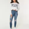 Curvy High-Rise Ripped Super Skinny Jeans in mittlerer Waschung Curvy High-Rise Ripped Super Skinny Jeans in mittlerer Waschung