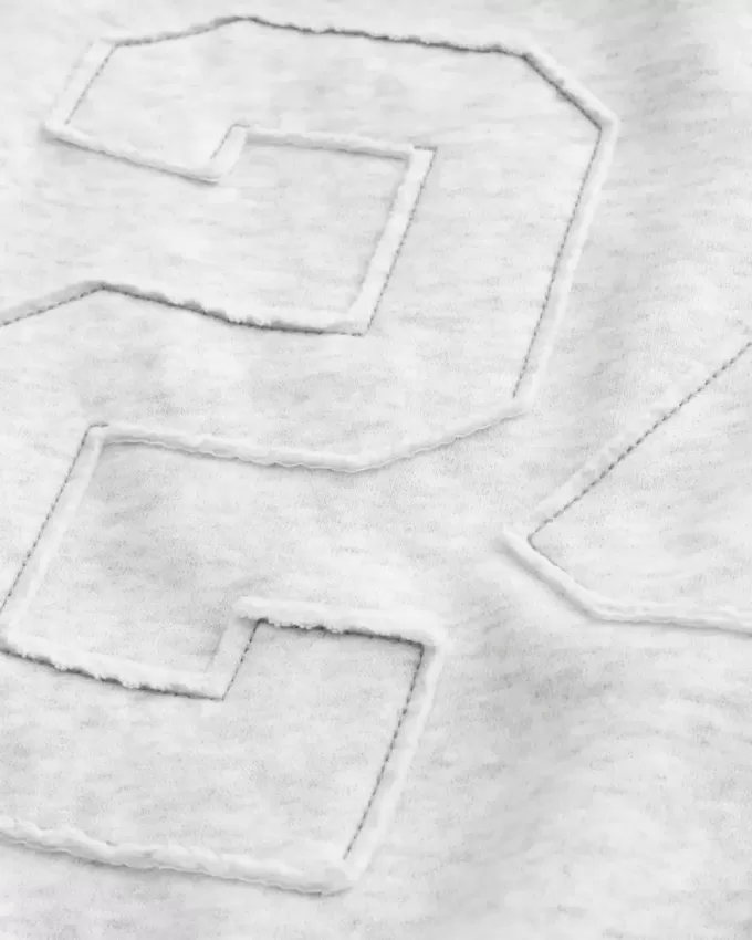 Einfaches, schulterfreies Sweatshirt mit Zahlengrafik Einfaches, schulterfreies Sweatshirt mit Zahlengrafik