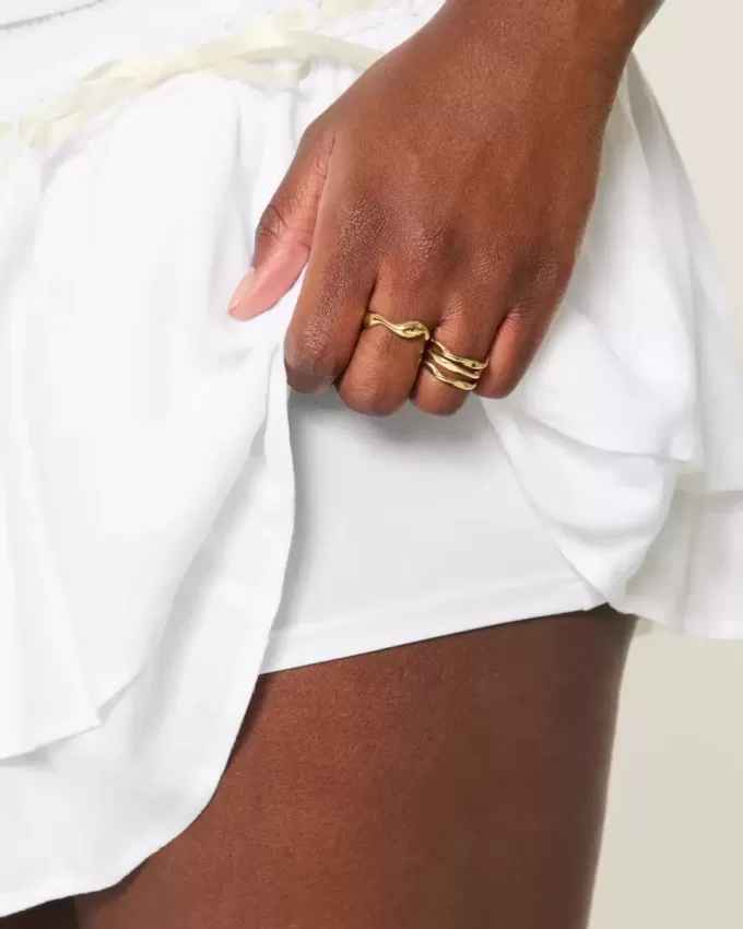 Gesmokter Mini-Skort mit Stufen Gesmokter Mini-Skort mit Stufen