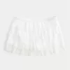 Gestufter Mini-Skort aus Spitzen-Chiffon Gestufter Mini-Skort aus Spitzen-Chiffon