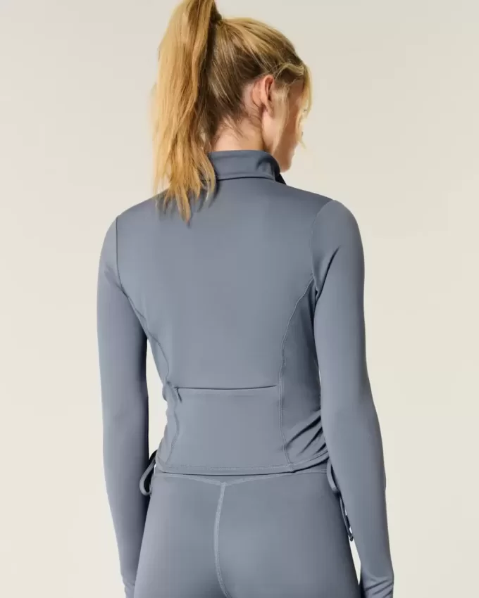 Gilly Hicks Active Recharge Jacke mit seitlichem Reißverschluss und Bindeband Gilly Hicks Active Recharge Jacke mit seitlichem Reißverschluss und Bindeband