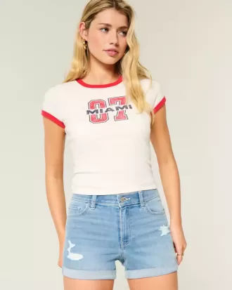 High-Rise Ripped Denim Shortie Shorts in mittlerer heller Waschung