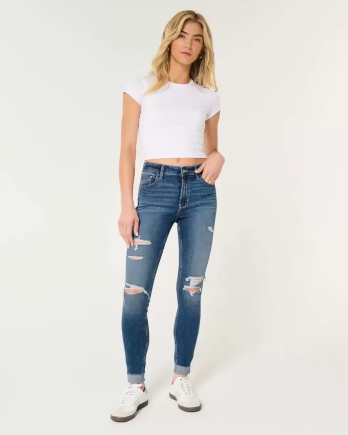 High-Rise-Risse, zerrissene Super Skinny Jeans in mittlerer Waschung High-Rise-Risse, zerrissene Super Skinny Jeans in mittlerer Waschung
