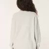 Hollister – Bequemer Pullover mit Cloud-Rose-Grafik Hollister – Bequemer Pullover mit Cloud-Rose-Grafik