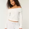 Hollister – Bequemer, schulterfreier Pullover mit Cloud-Stickerei Hollister – Bequemer, schulterfreier Pullover mit Cloud-Stickerei
