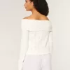 Hollister – Bequemer, schulterfreier Pullover mit Cloud-Stickerei Hollister – Bequemer, schulterfreier Pullover mit Cloud-Stickerei