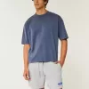Hollister – Feel Good – Fleece-Shorts mit Ford-Grafik bis zur Mitte des Oberschenkels Hollister – Feel Good – Fleece-Shorts mit Ford-Grafik bis zur Mitte des Oberschenkels