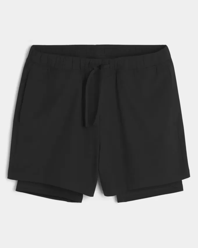 Hybrid-Aktivshorts bis zur Mitte des Oberschenkels Hybrid-Aktivshorts bis zur Mitte des Oberschenkels