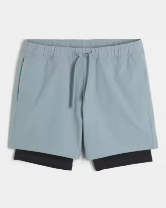 Hybrid-Aktivshorts bis zur Mitte des Oberschenkels Hybrid-Aktivshorts bis zur Mitte des Oberschenkels