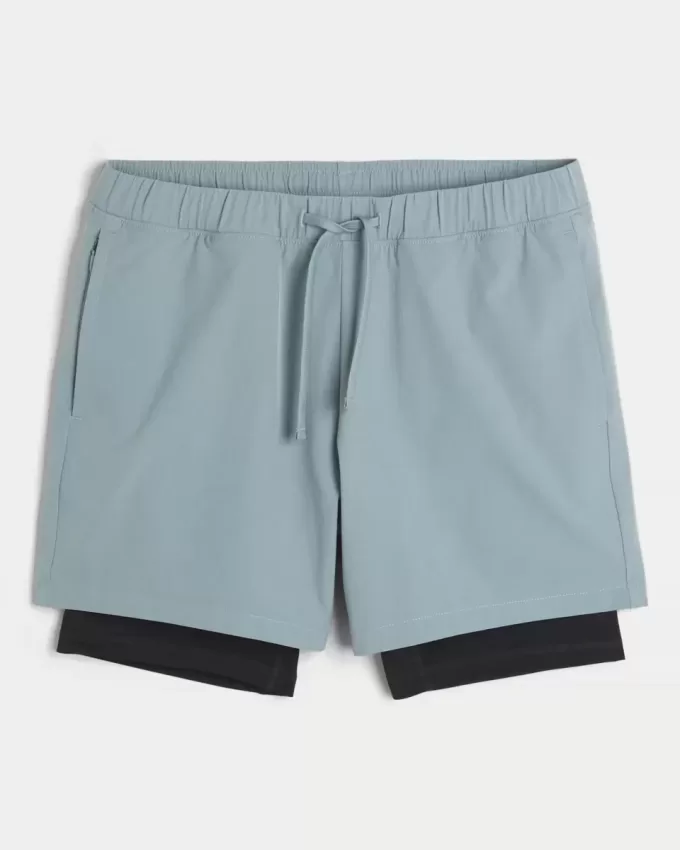 Hybrid-Aktivshorts bis zur Mitte des Oberschenkels Hybrid-Aktivshorts bis zur Mitte des Oberschenkels