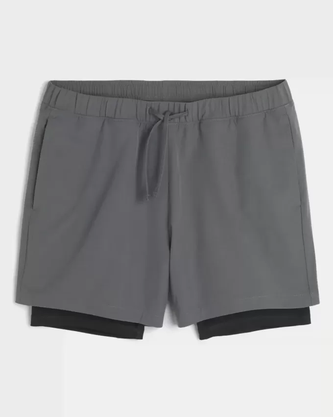Hybrid-Aktivshorts bis zur Mitte des Oberschenkels Hybrid-Aktivshorts bis zur Mitte des Oberschenkels