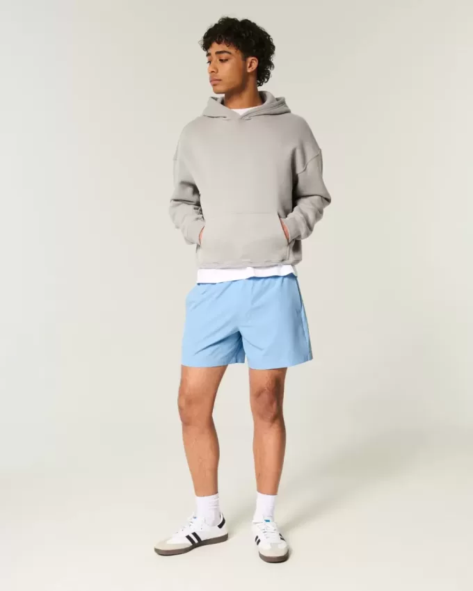 Hybrid-Aktivshorts bis zur Mitte des Oberschenkels Hybrid-Aktivshorts bis zur Mitte des Oberschenkels